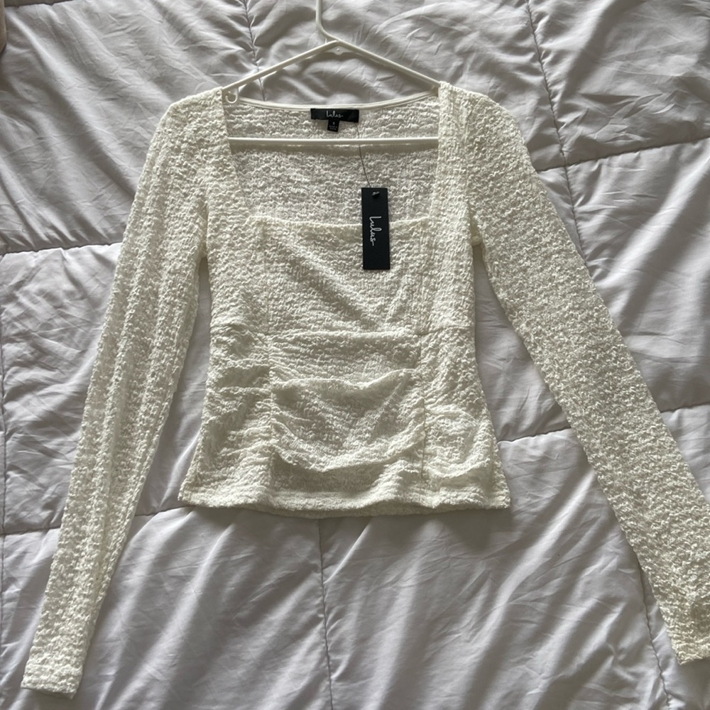 New with tags lace cropped top. Never been worn!